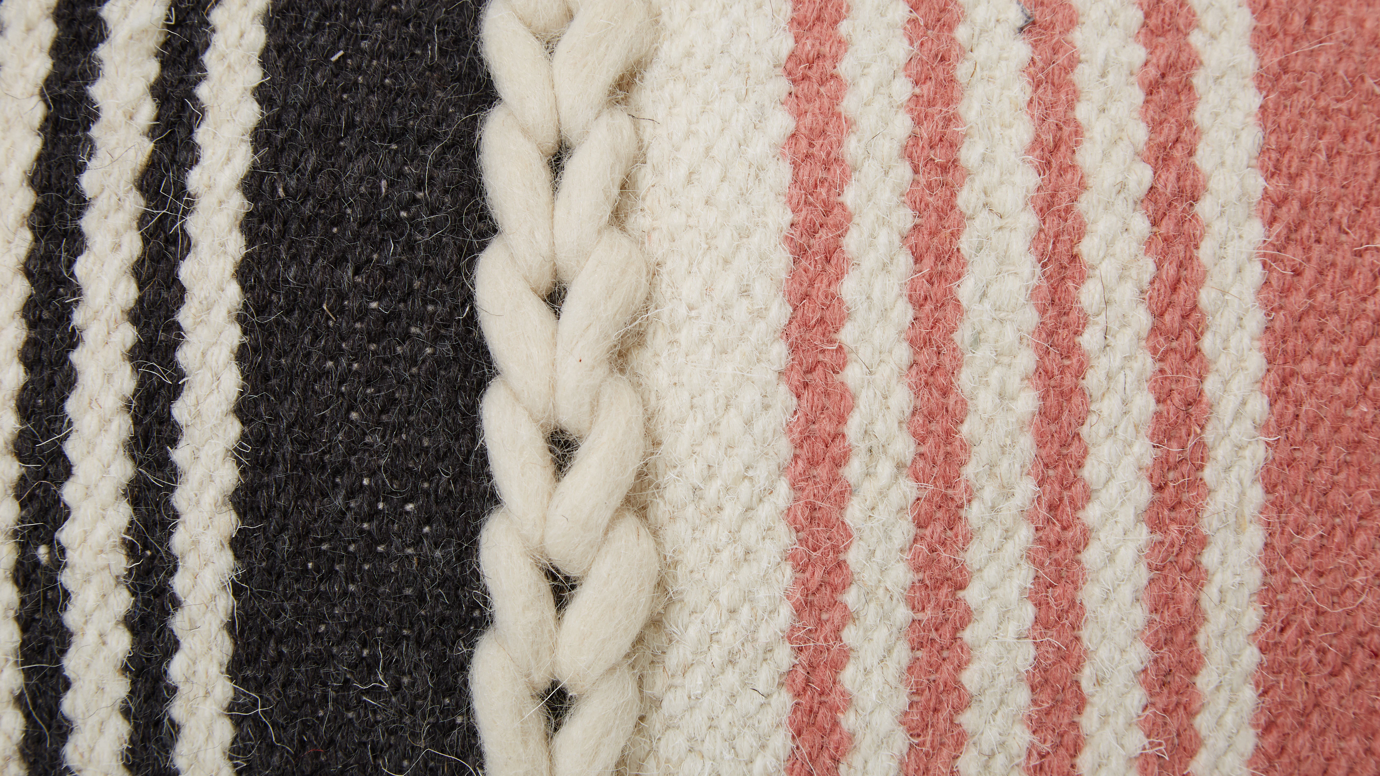 braided pink pillow