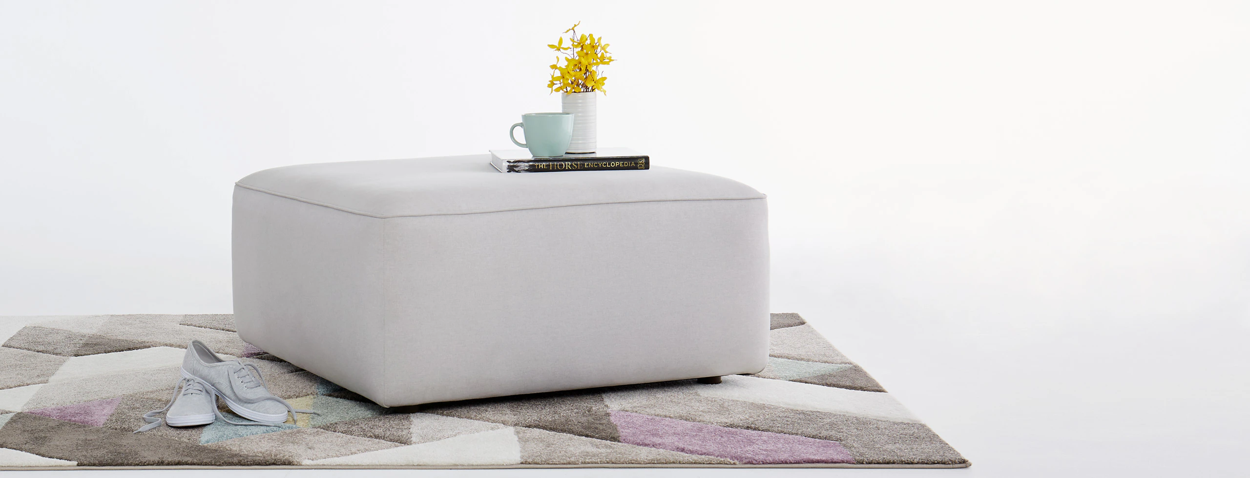 Logan ottoman devon platinum lastudio hero
