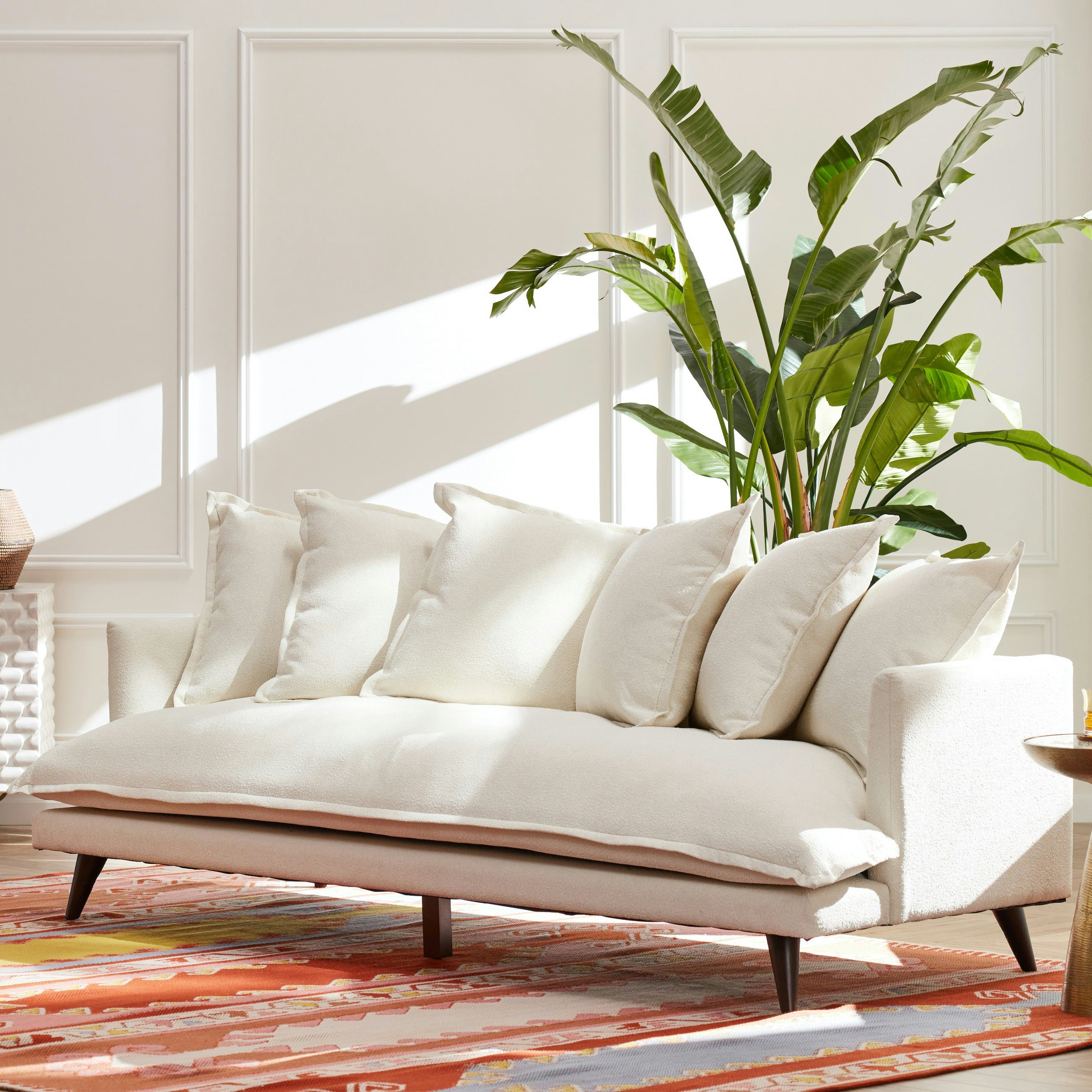 Become one with the pillows on this supremely cozy contemporary collection,  practically overflowing with plush seating and pillowed back options.